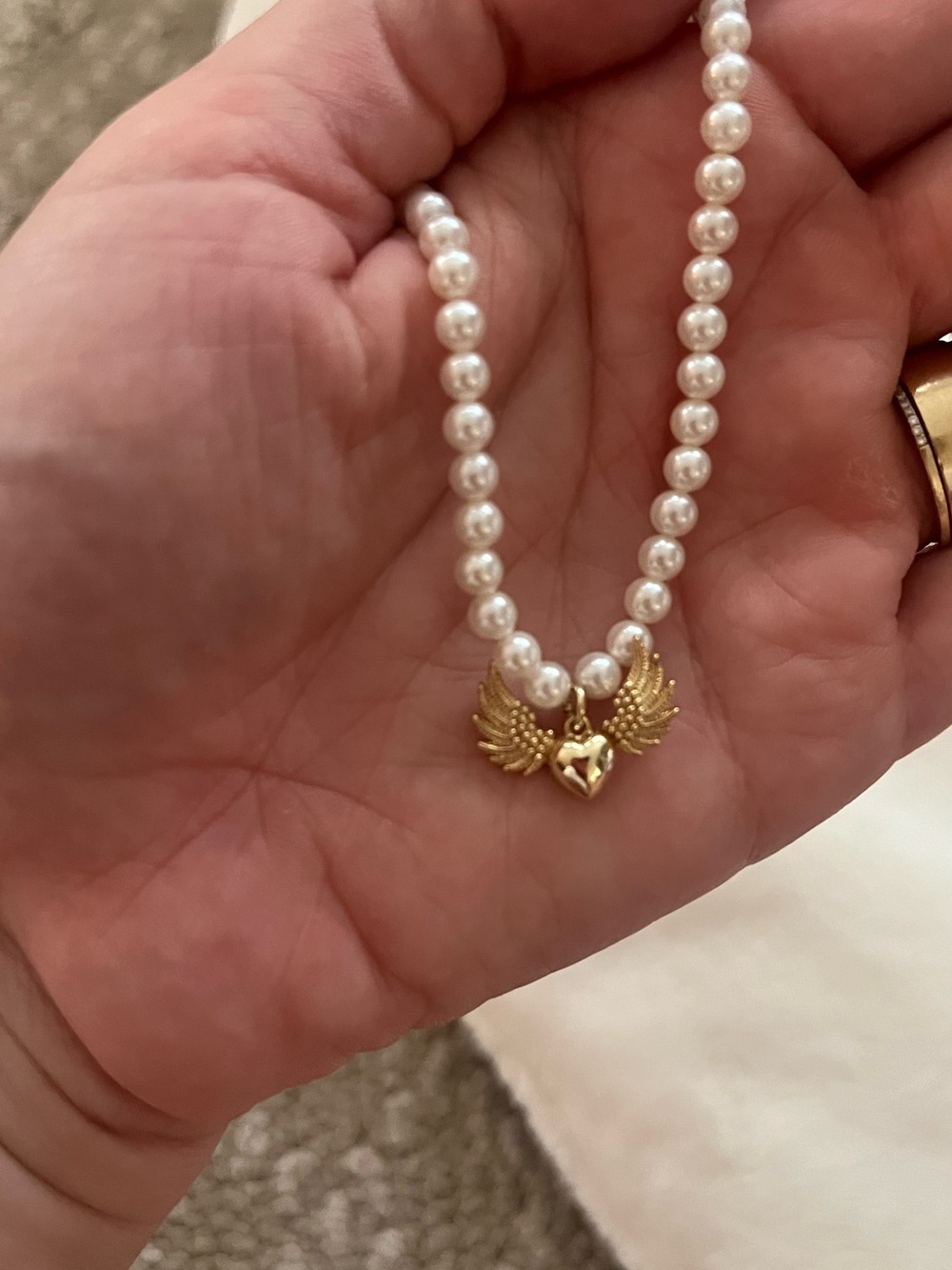 Pearl Necklace with Gold Winged Heart Pendant